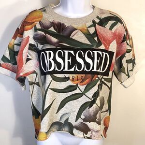 Multi-colored floral sweatshirt size S (small) from Forever21